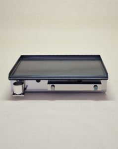Cooking on a steel plate with a Furlan gas grill