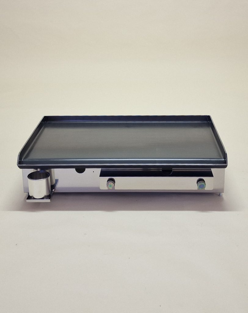 Cooking on a steel plate with a Furlan gas grill